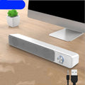 Black and white 2.0 channel wired desktop computer speaker with optional Bluetooth.