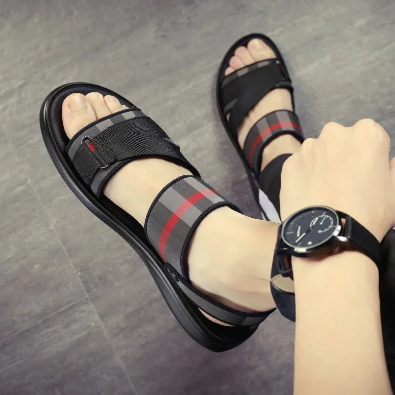 Youth leisure sports sandal with flexible Lycra upper and polyurethane sole on a size conversion chart background.