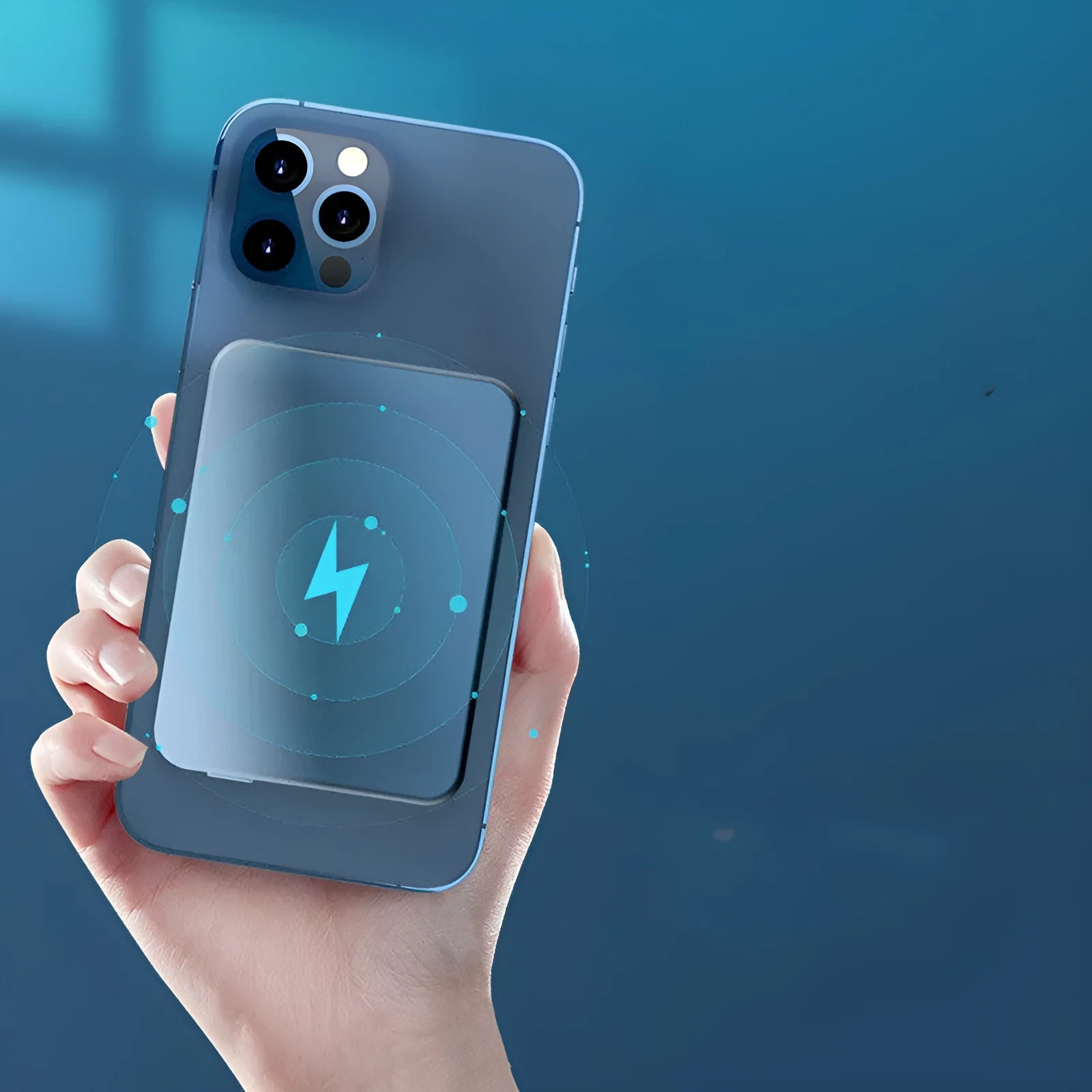 Silver aluminium wireless magnetic charging power bank for Apple phones, showing compact size.