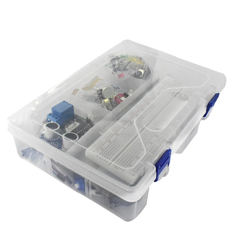 White box containing Arduino Uno R3 board, RFID module, sensors, and components for electronics learning.