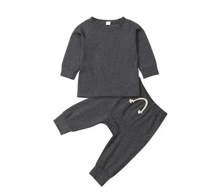 Blue cotton baby romper tracksuit set with cartoon pattern, shown on size chart for 6M to 24M.
