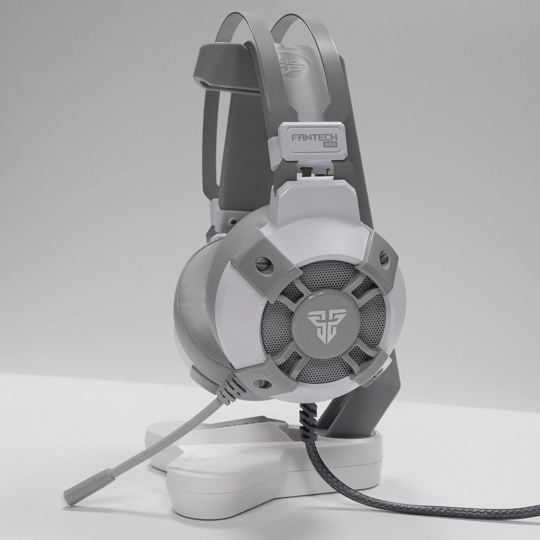 Black FANTECH HG11 USB gaming headset with RGB lights and inline remote control.