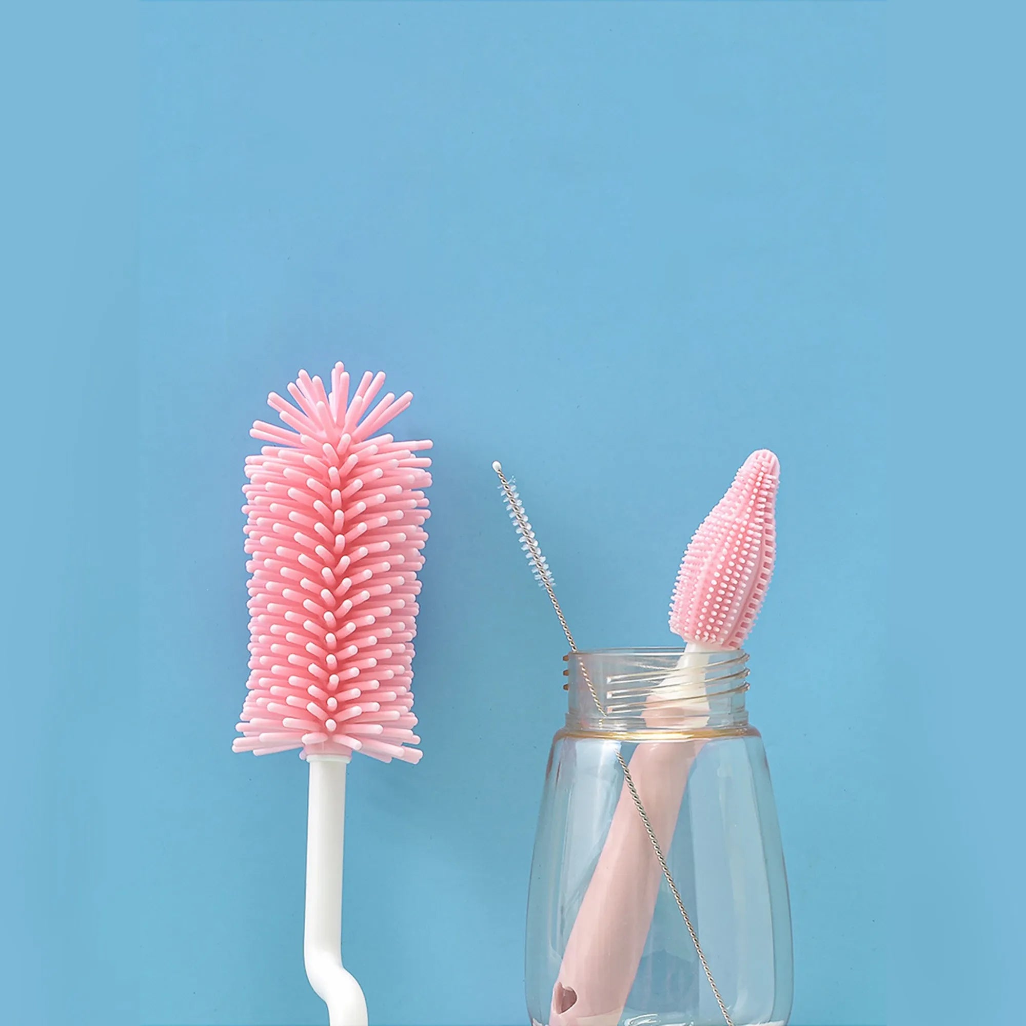 Silicone baby bottle brush set with three brushes including straw cleaner in blue pink yellow colours