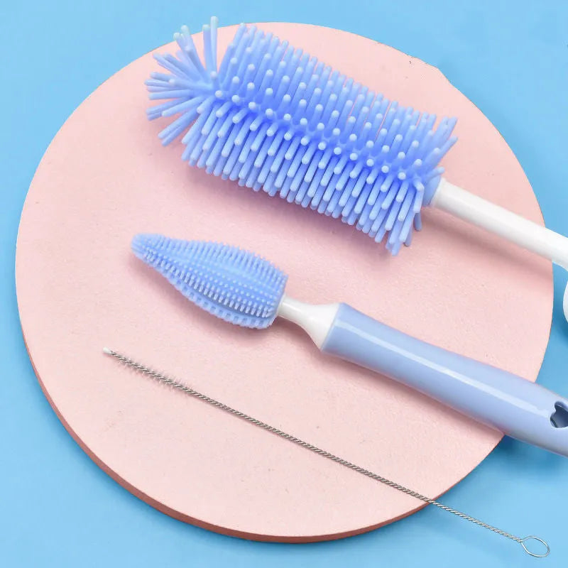 Silicone baby bottle brush set with three brushes including straw cleaner in blue pink yellow colours