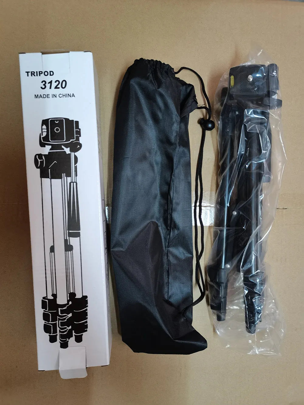 Black aluminium camera tripod with 4-section legs extended, 3D head, and quick-release plate.