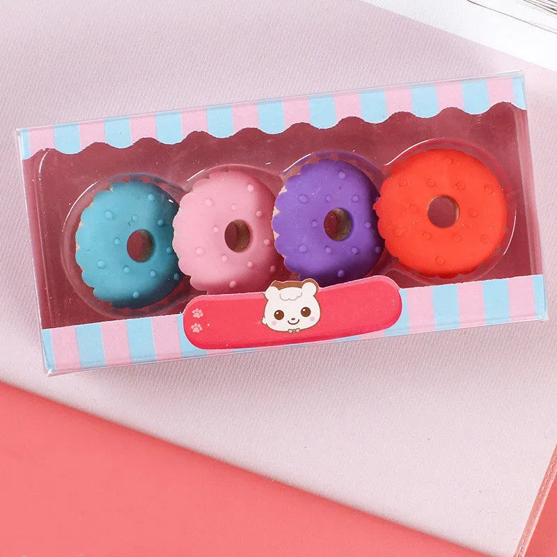 Set of 12 colourful cartoon erasers shaped like ice cream cones, donuts, and lollipops for children