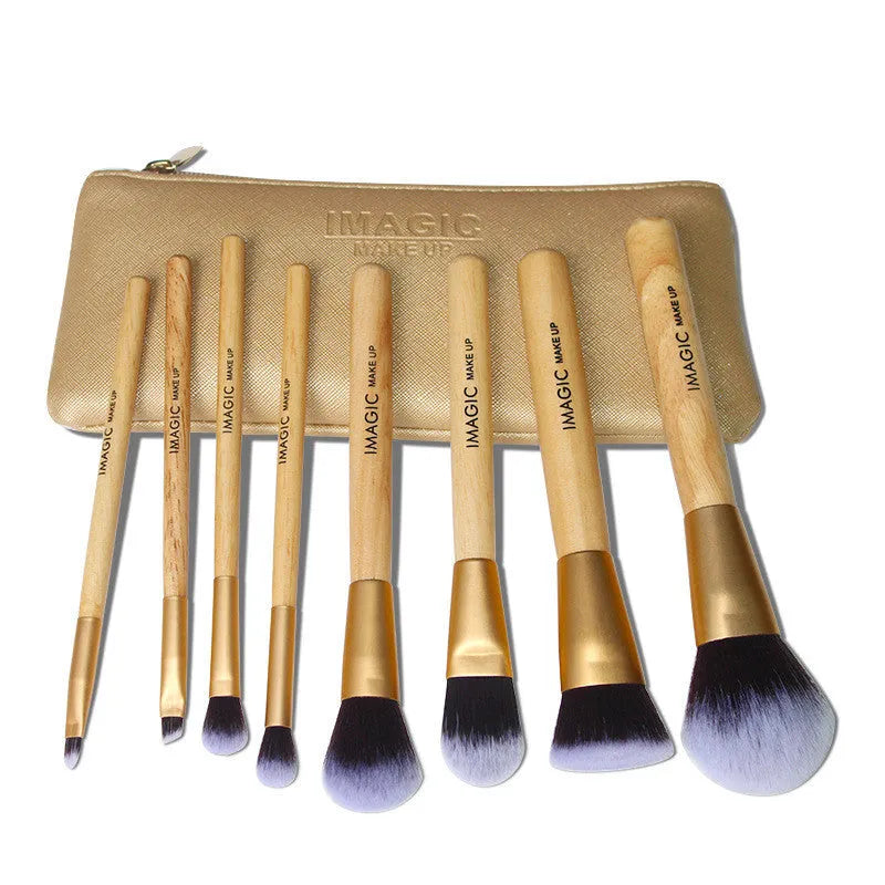Eight-piece makeup brush set including foundation, blush, powder, eyeshadow, and highlighter brushes in assorted colours.