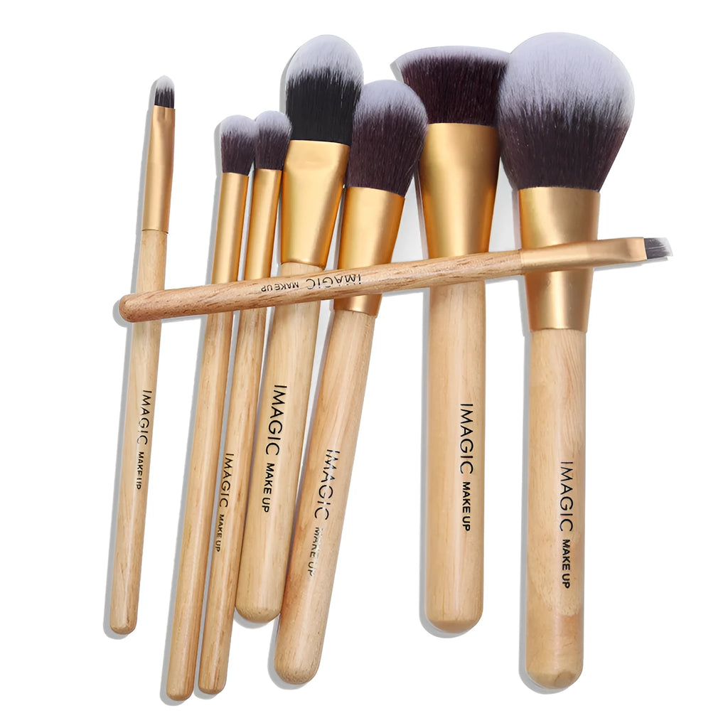 Eight-piece makeup brush set including foundation, blush, powder, eyeshadow, and highlighter brushes in assorted colours.