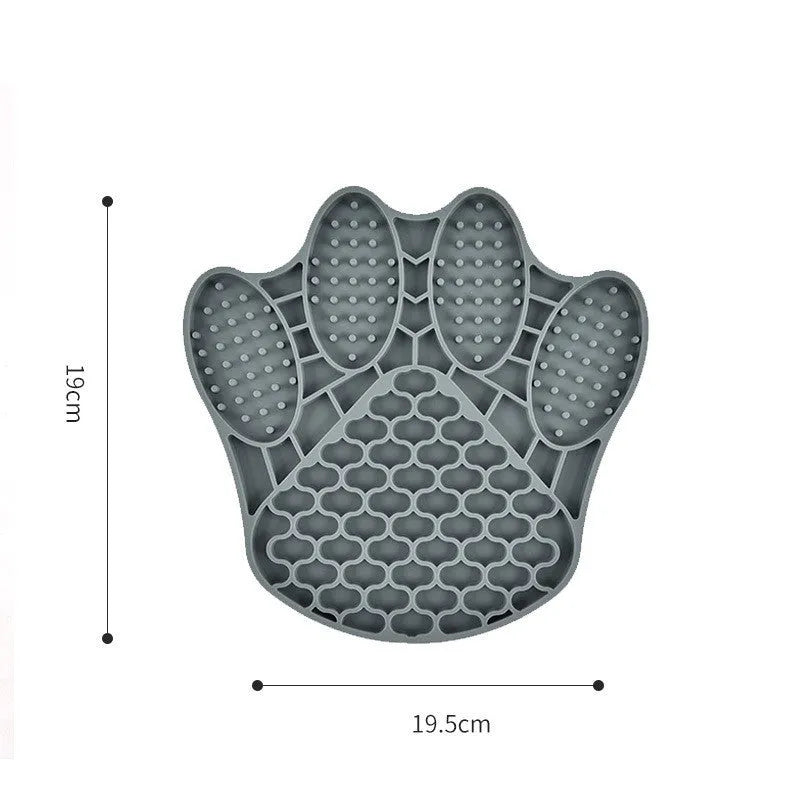 Claw-shaped silicone dog licking mat in blue for slow feeding and anti-choke use