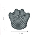 Claw-shaped silicone dog licking mat in blue for slow feeding and anti-choke use