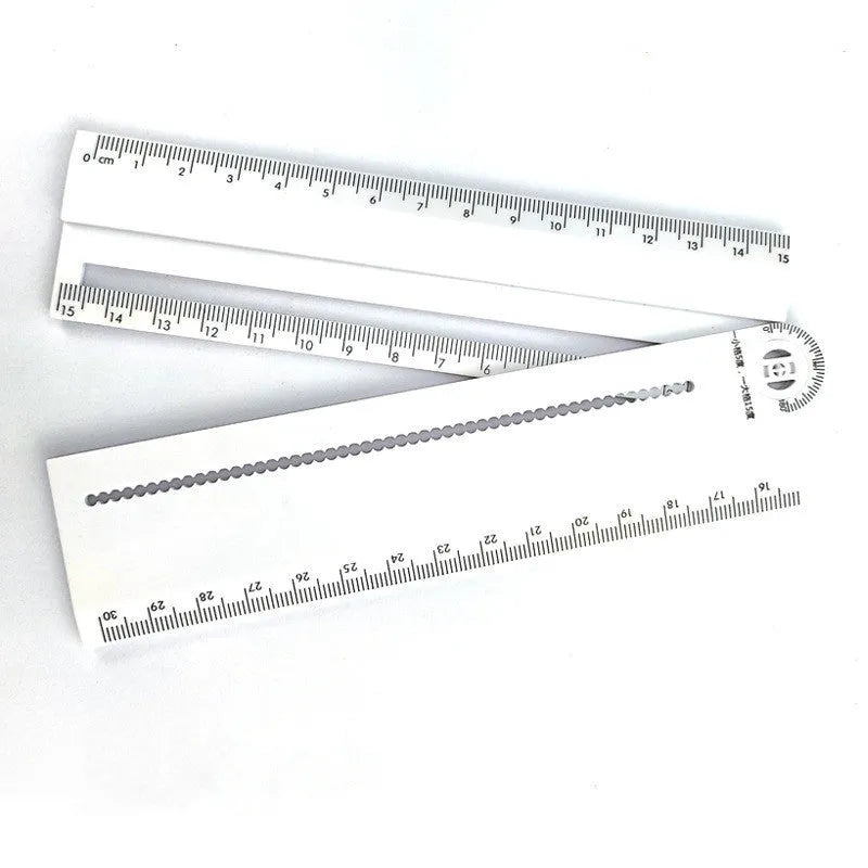 White plastic multi-function ruler with straight edge and angle measurement markings at 30cm length