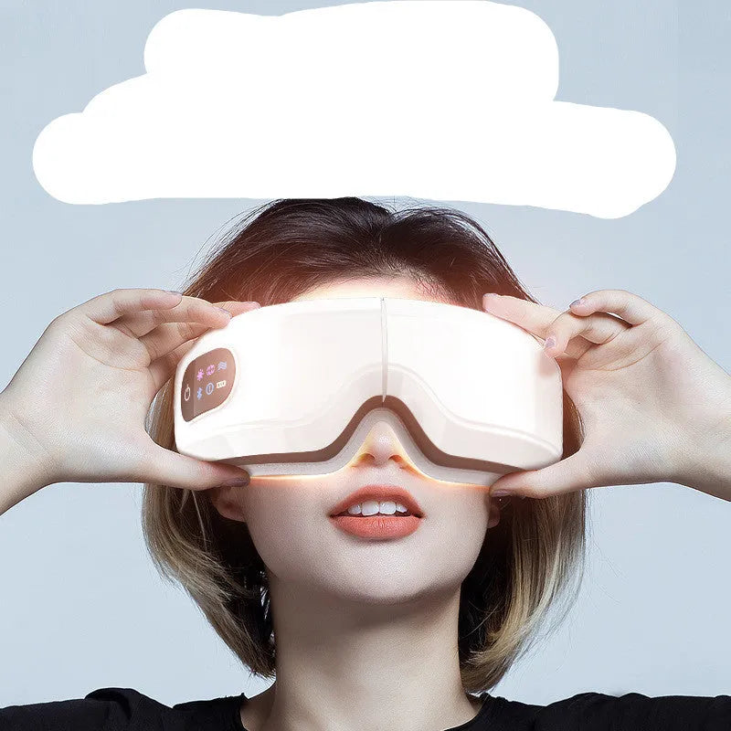 White eye massager with 16D airbag system, hot compress, and Bluetooth music for migraine relief