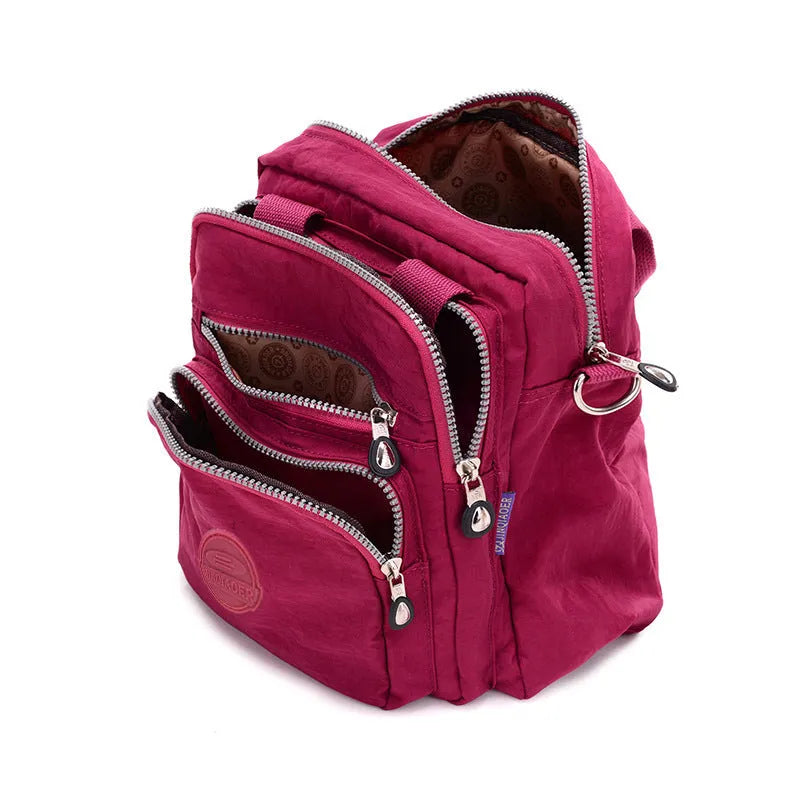 Ladies waterproof tear-proof nylon cross-body bag in beige, showing 25cm height and single shoulder strap