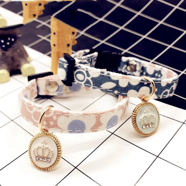 Adjustable cloth floral pet collar in light blue with sweet floral pattern, suitable for cats and small dogs.