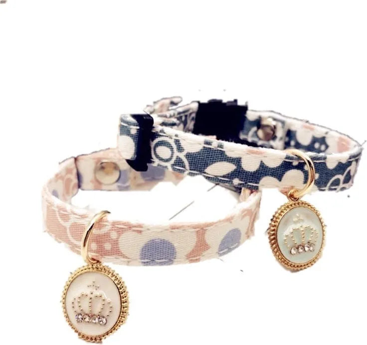 Adjustable cloth floral pet collar in light blue with sweet floral pattern, suitable for cats and small dogs.