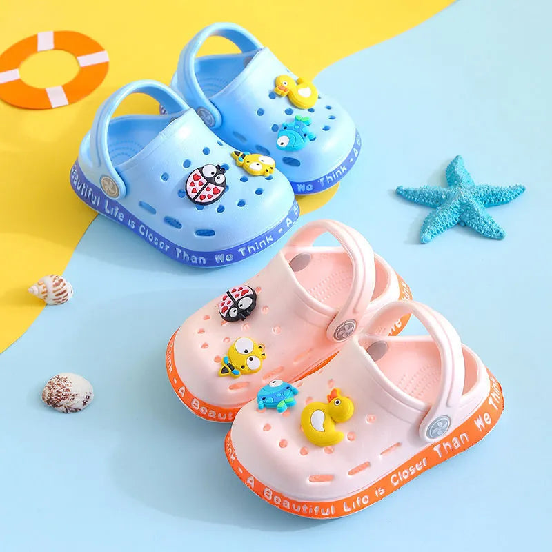 Colourful PVC kids slippers with cartoon animal prints in toddler and child sizes