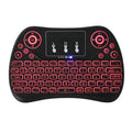 Compact white wireless keyboard with seven-colour backlit keys and English layout.