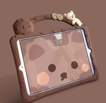 Brown cartoon-style silicone sleeve with a folding stand for an iPad tablet on a wooden table.