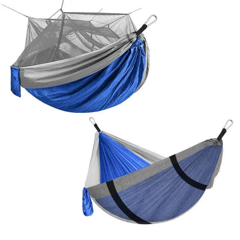 Blue camping hammock with mosquito net and sling ropes for outdoor use