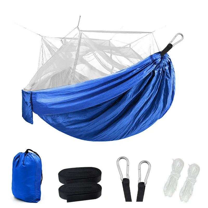 Blue camping hammock with mosquito net and sling ropes for outdoor use