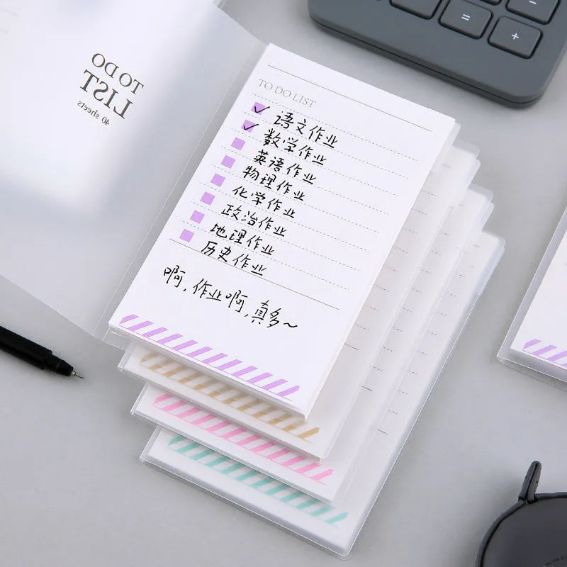 Yellow, green, and purple frosted PP cover notebooks showing 13 by 8 cm size and tearable pages.