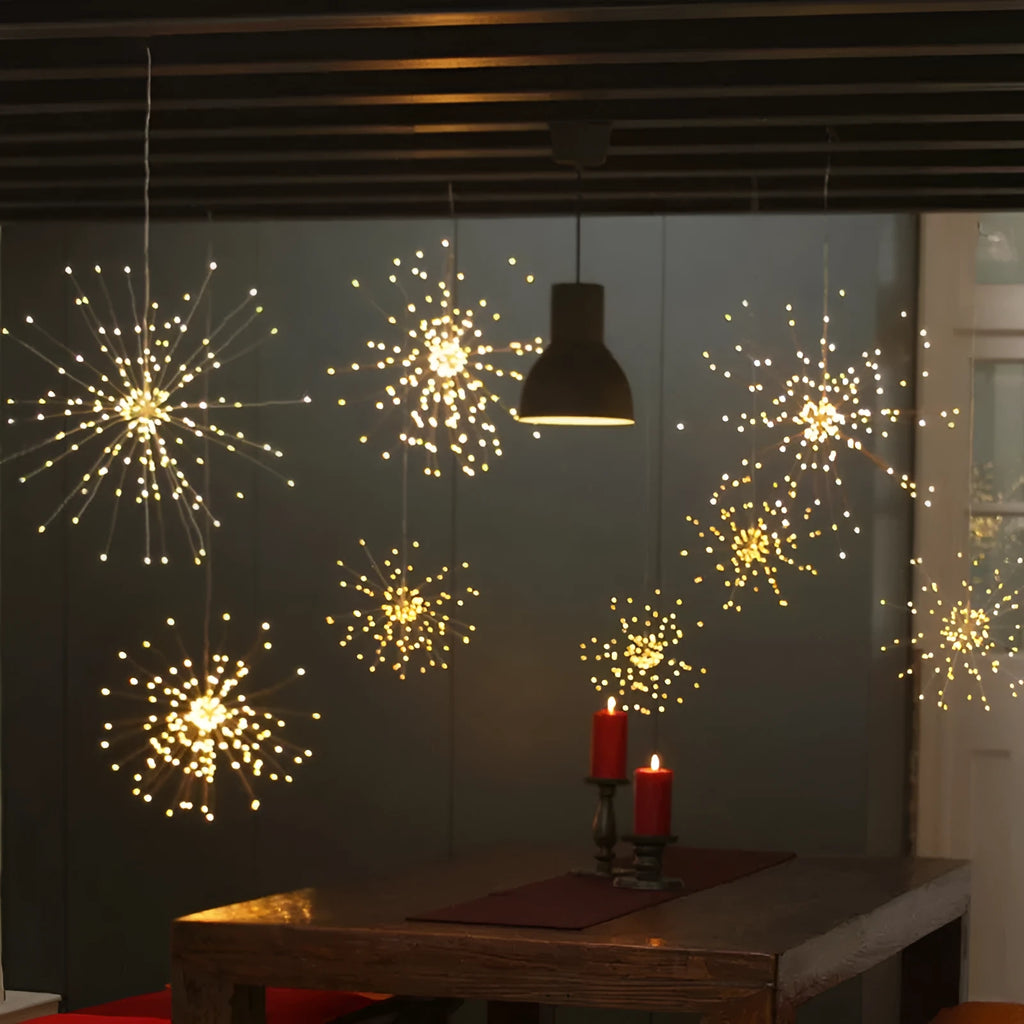Solar-powered LED meteor shower string light with multiple warm white bulbs for outdoor garden decoration.