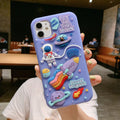 Purple silicone iPhone case featuring astronaut cartoon design for multiple model compatibility
