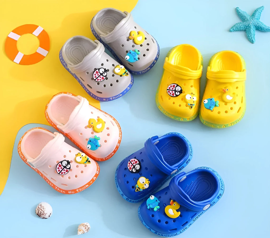 Colourful PVC kids slippers with cartoon animal prints in toddler and child sizes