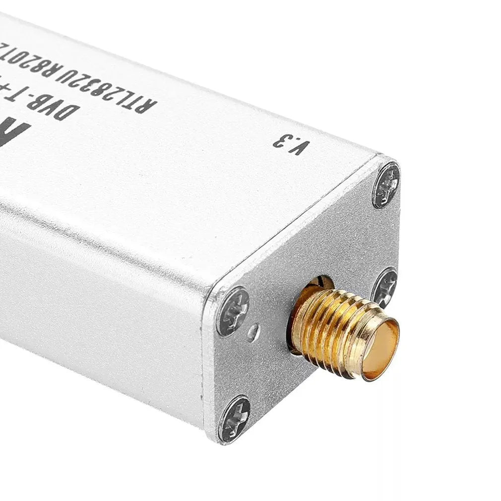 Black or white metal-cased all-band software defined radio receiver with a golden SMA antenna connector.