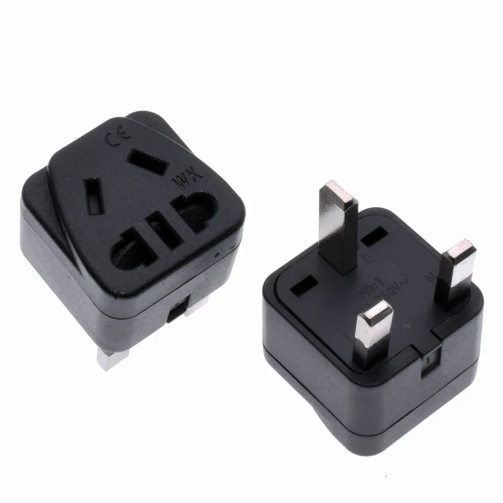 White and black square three-pin international plug adapter for 13A grounded connections.