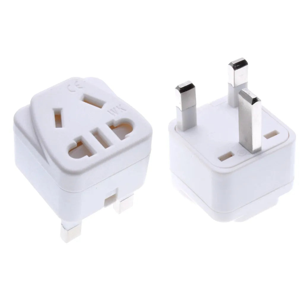 White and black square three-pin international plug adapter for 13A grounded connections.