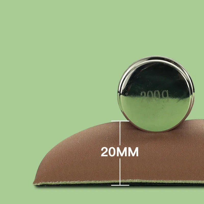 Green kiwi-shaped mouse pad with thick wrist support on a desk