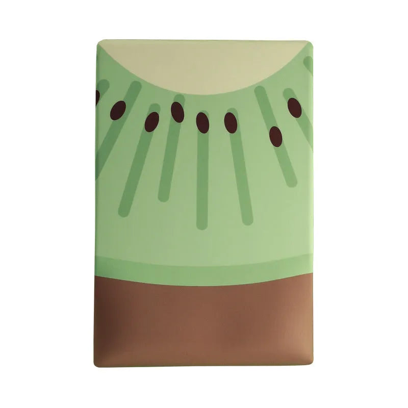 Green kiwi-shaped mouse pad with thick wrist support on a desk