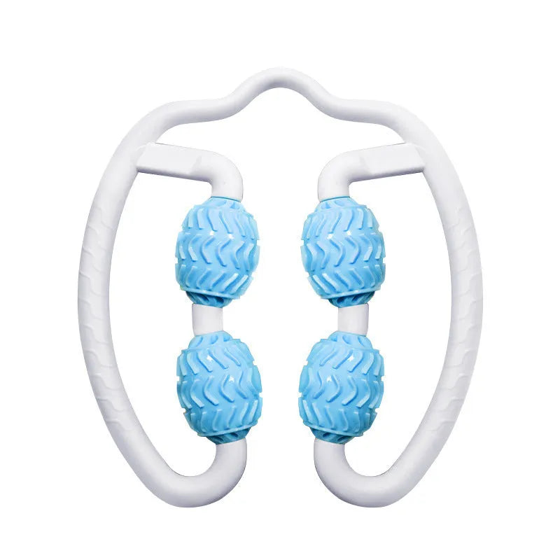 Purple and pink silicone annular leg massage rollers on a plain background.