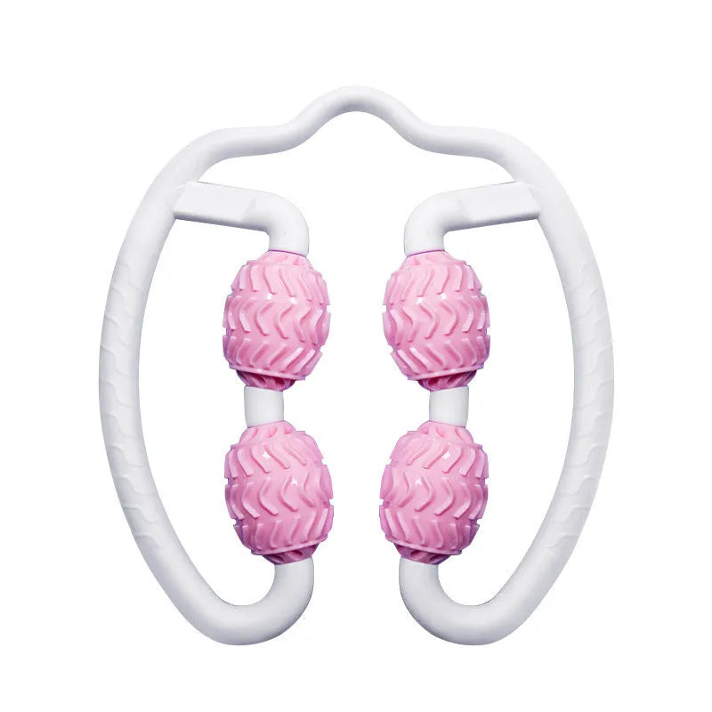 Purple and pink silicone annular leg massage rollers on a plain background.