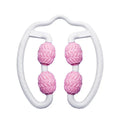 Purple and pink silicone annular leg massage rollers on a plain background.