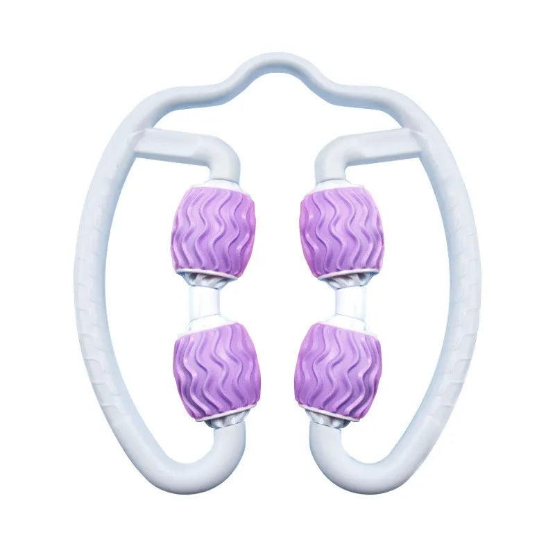 Purple and pink silicone annular leg massage rollers on a plain background.