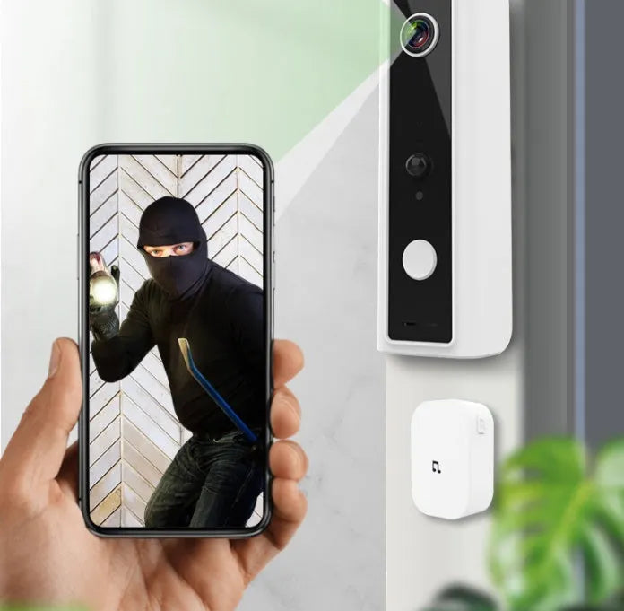Smart WiFi video doorbell camera with wide-angle lens and night vision, white casing, on a door frame