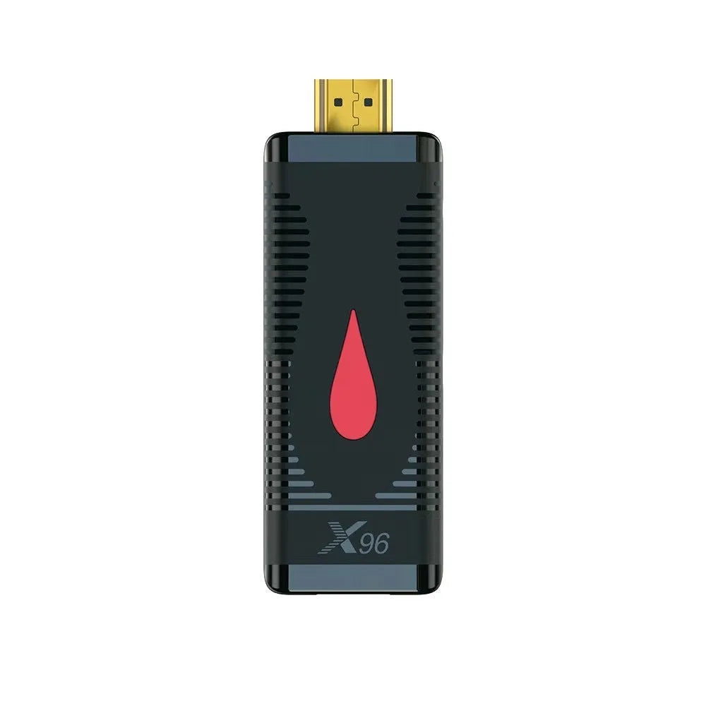 Compact black TV stick dongle set-top box with remote control, HDMI cable, and power supply.