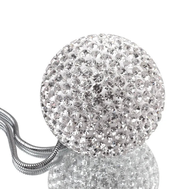 Car pendant with diamond crystal ball design in soft clay and rhinestone, approximately 5cm diameter, champagne colour