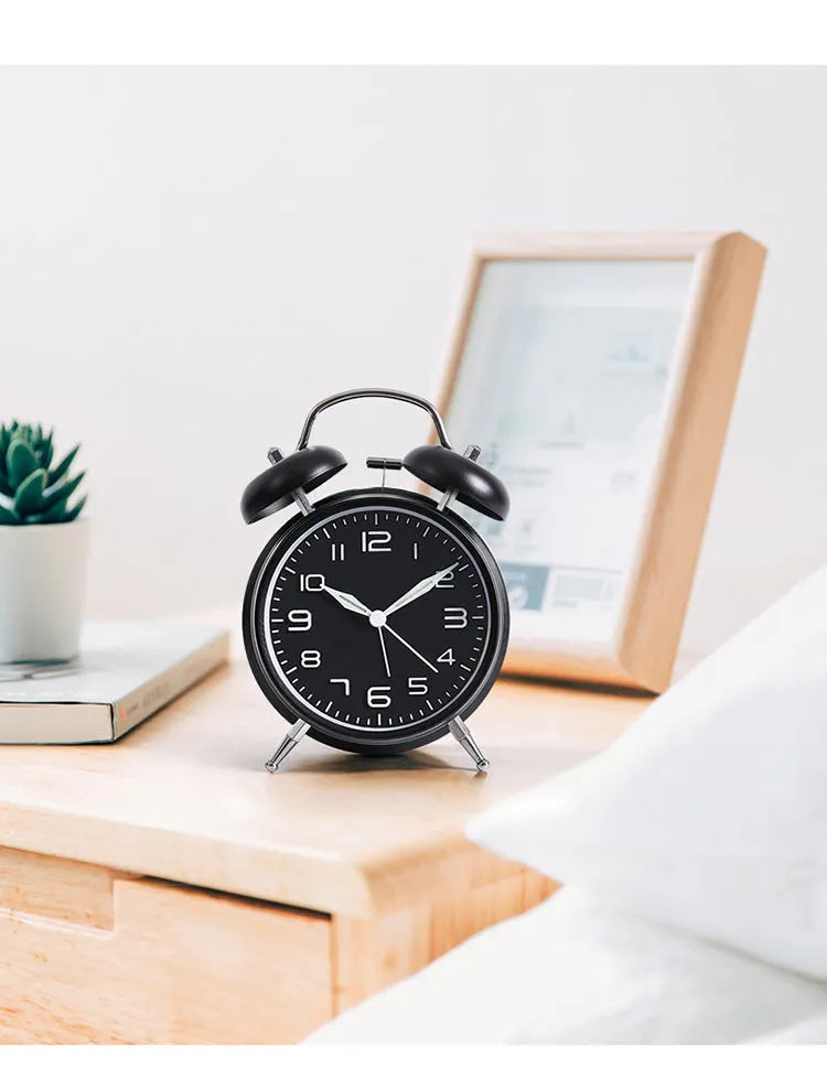 Big Sound Metal Alarm Clock with black metal case, 4-inch luminous dial, and metal bells on top