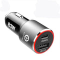 83W dual-port fast car charger plugged into a 12V socket with a laptop and phone connected via USB-C and QC3.0 cables.