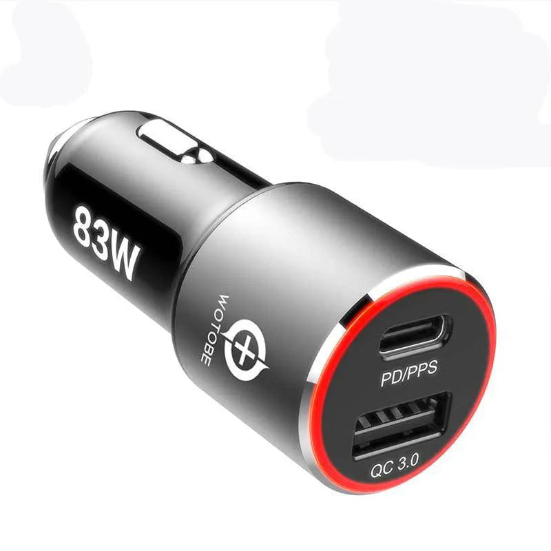 83W dual-port fast car charger plugged into a 12V socket with a laptop and phone connected via USB-C and QC3.0 cables.