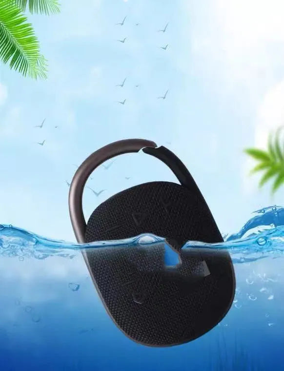 Compact portable Bluetooth wireless speaker in one of six colour options: black, blue, green, pink, red, or silver grey.