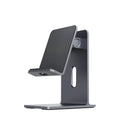 Dark Space Grey zinc alloy mobile phone holder with adjustable lazy bracket arm holding a smartphone on a desk.