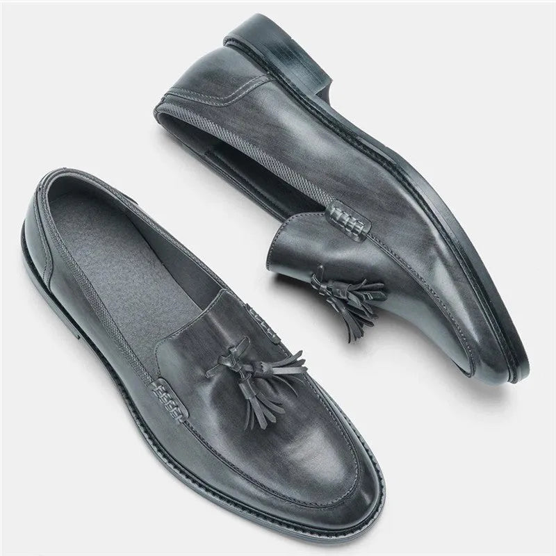 Men's brown formal leather loafers with tassels, PU upper, composite sole, low-cut round toe design on a clean background
