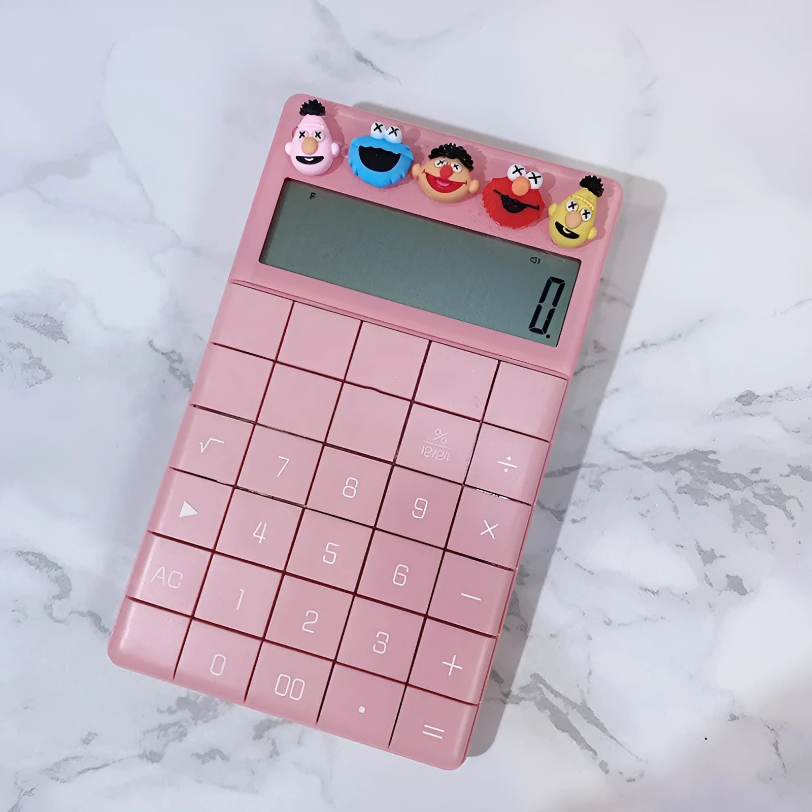 Cute cartoon real voice multi function big button calculator in orange with LED display on desk