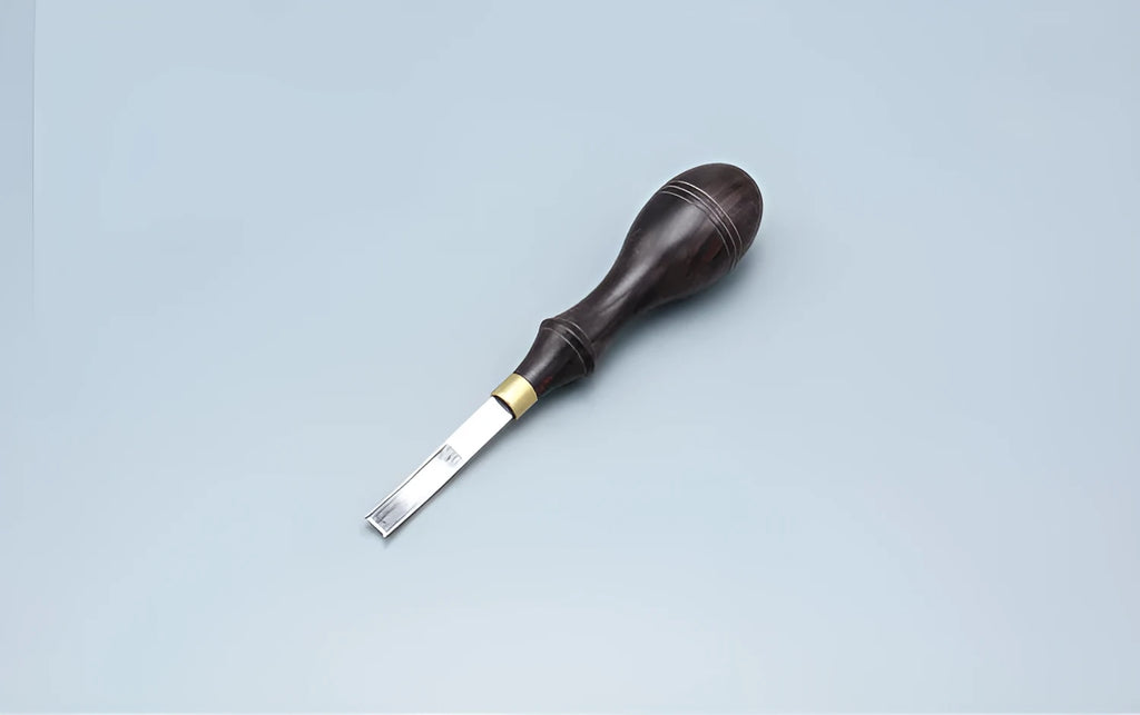 Sectional wide shovel edge leather thinning knife for edge bevelling.