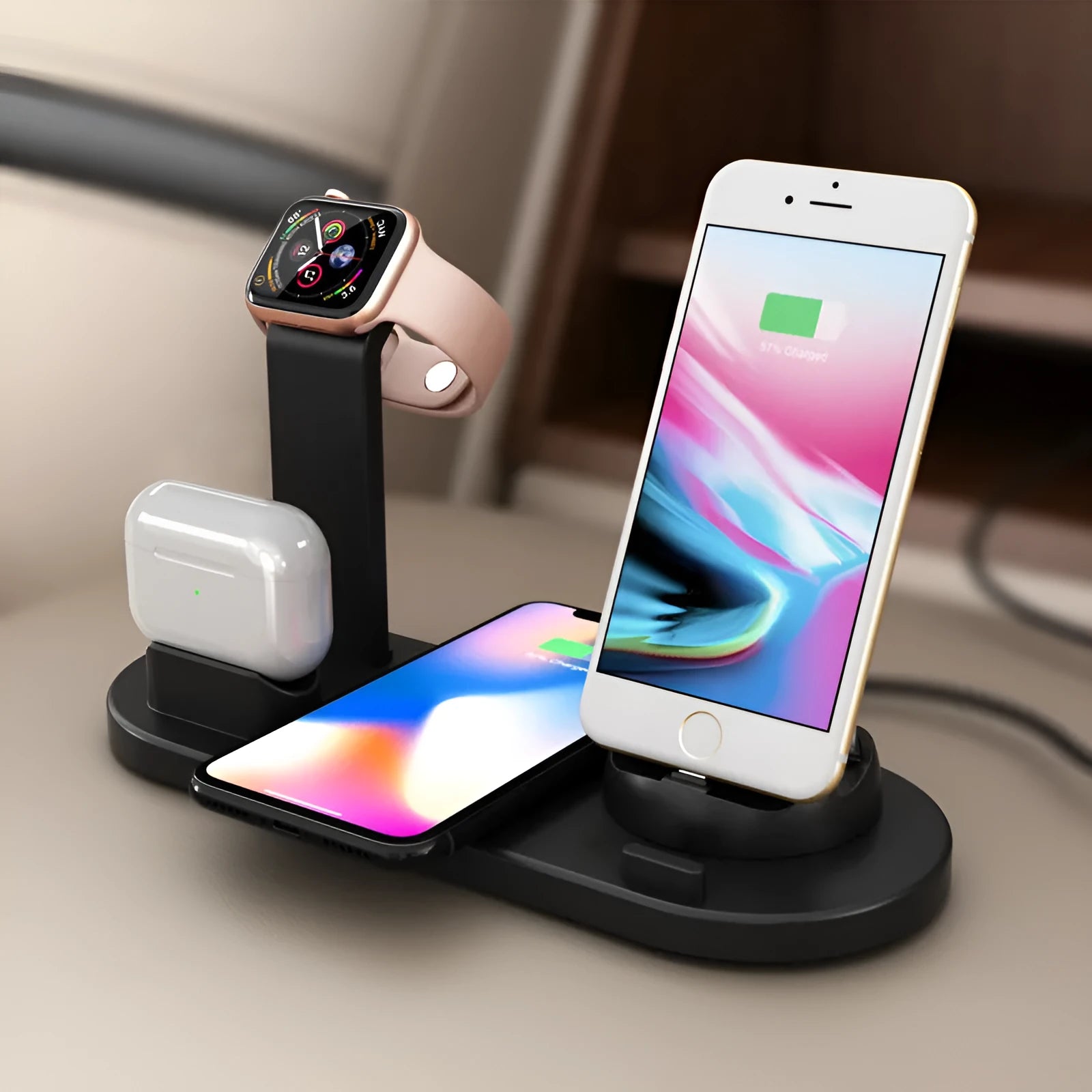 Black three-in-one charging bracket holding smartphone, watch and wireless headset with USB cable connected