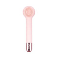 Grey and pink inFace automatic electric shower brush with four rotating brush heads on display.